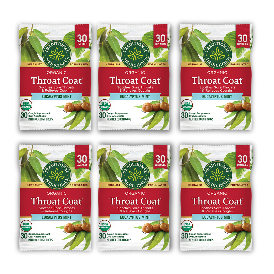 Six packs of Throat Coat® Eucalyptus Mint Lozenges, 30ct, are arranged in two rows. These lozenges, renowned for soothing sore throats, deliver a comforting relief with each drop thanks to their refreshing blend of menthol and peppermint.